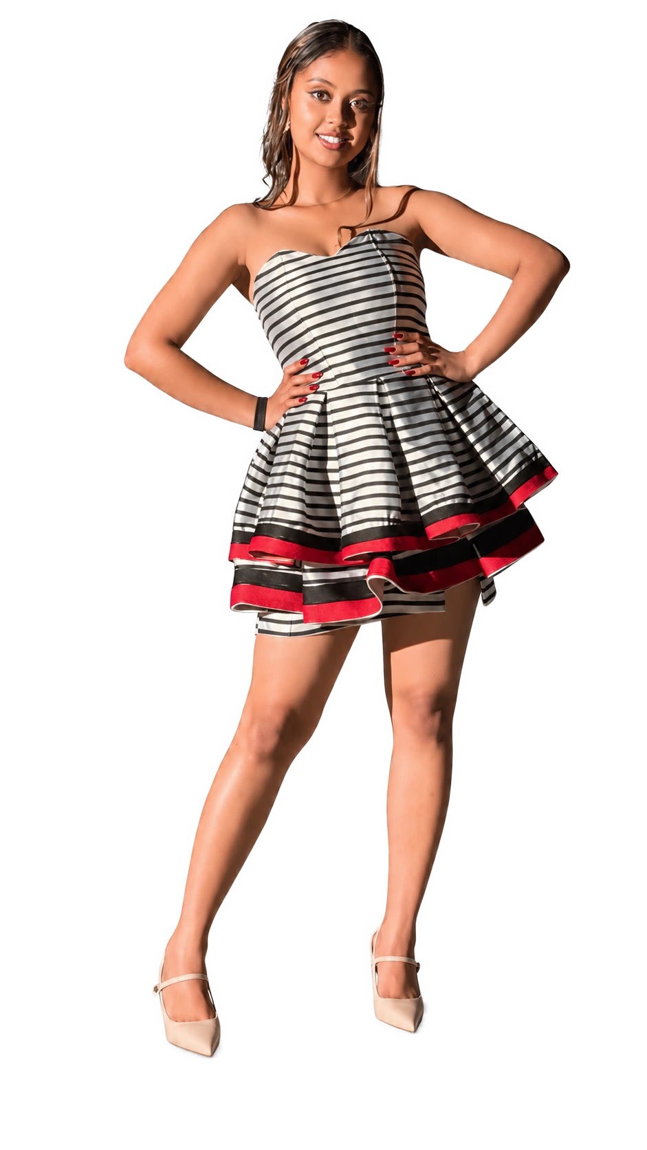 Efratah standing confidently in a striped Ethiopian-inspired dress
